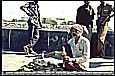 1995_INDIA_BOMBAY (Mumbai)_be careful_a snake charmer with some cobras_my motorcycle-trip around the world_Jochen A. Hbener