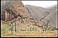 1996_AUSTRALIA_Uluru-Ayers Rock_magic place, unbelievable atmosphere and scenery, wonderful colour change_coming close you see that it is not a real monolith_there are whole series of strange caves and eroded gullies_my motorcycle-trip around the world 1995-96_Jochen A. Hbener